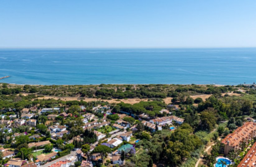 Aerial view of Cabopino towards the sea